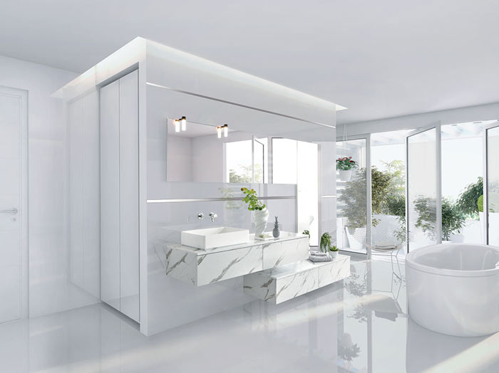 Vue en biais de la salle de bains Arcos Edition coloris gris clair marbré avec l’ensemble bain destructuré et la baignoire ovale.